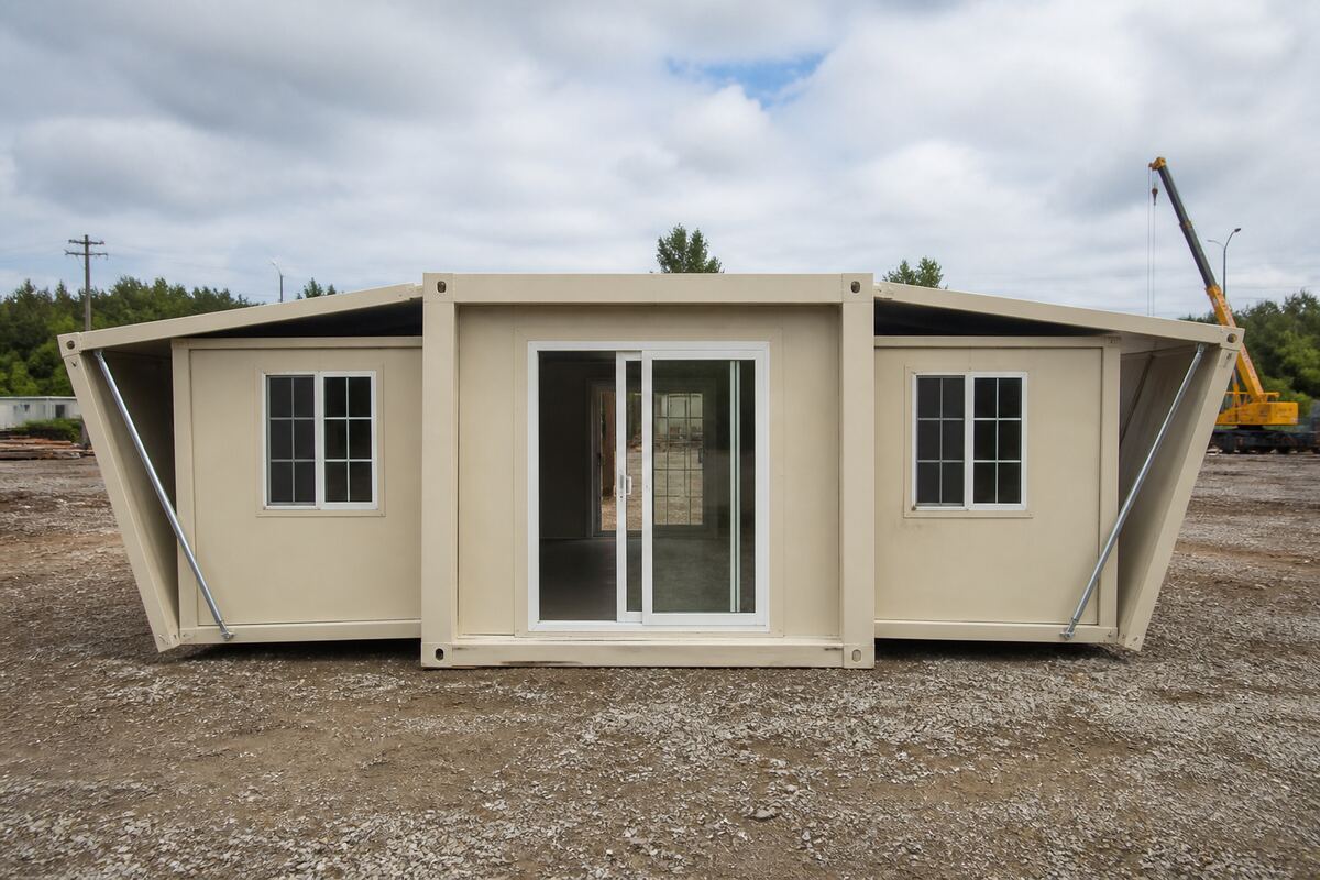 Expandable steel prefab unit on a rural lot, editorial reference